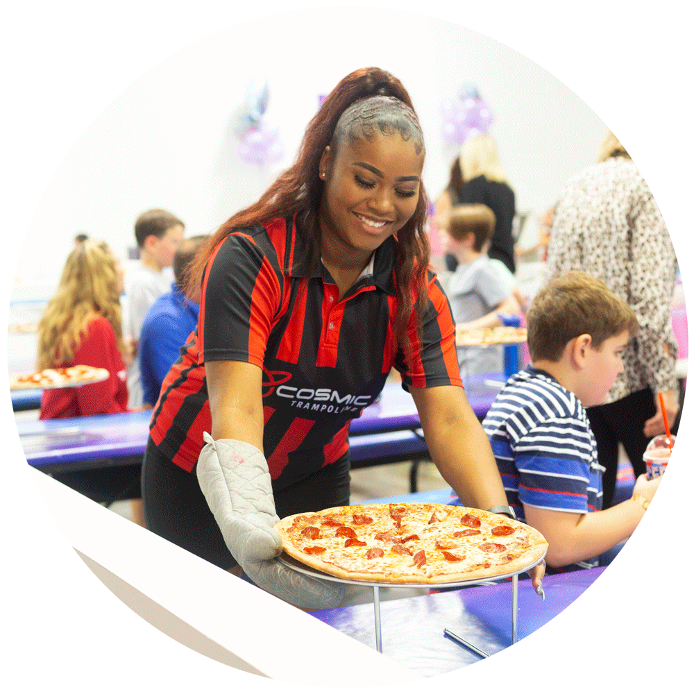 Cosmic Air Birthday Party Host serving pizza during a kids birthday party