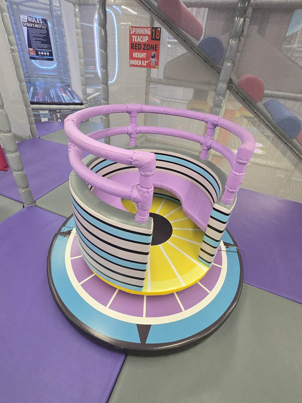 Spinning Teacup ride at Cosmic Air Adventure Park in Texas, fun for kids.