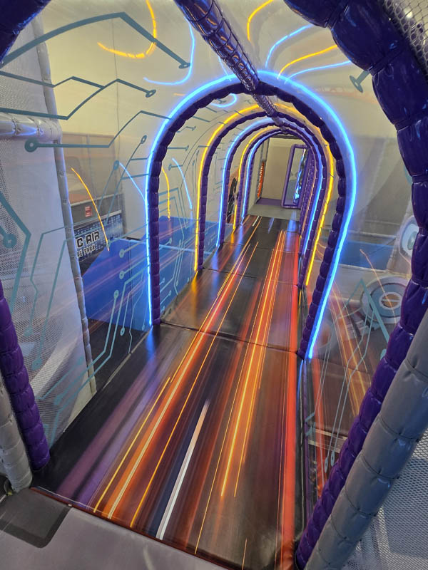 Transparent Tunnel attraction at Cosmic Air indoor park, Webster, TX.