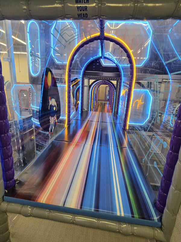 Transparent Tunnel attraction at Cosmic Air indoor park, Webster, TX.