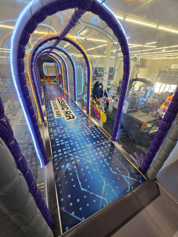 Transparent Tunnel attraction at Cosmic Air indoor park, Webster, TX.