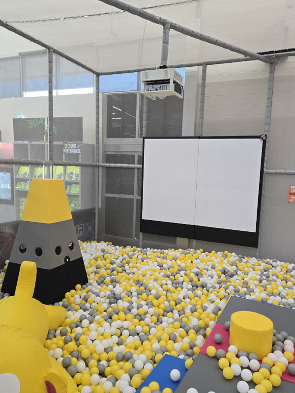 Interactive Ball Game attraction at Cosmic Air indoor park in Webster, TX.